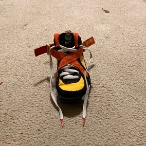 Nike orange yellow and black shoes kids 4.5